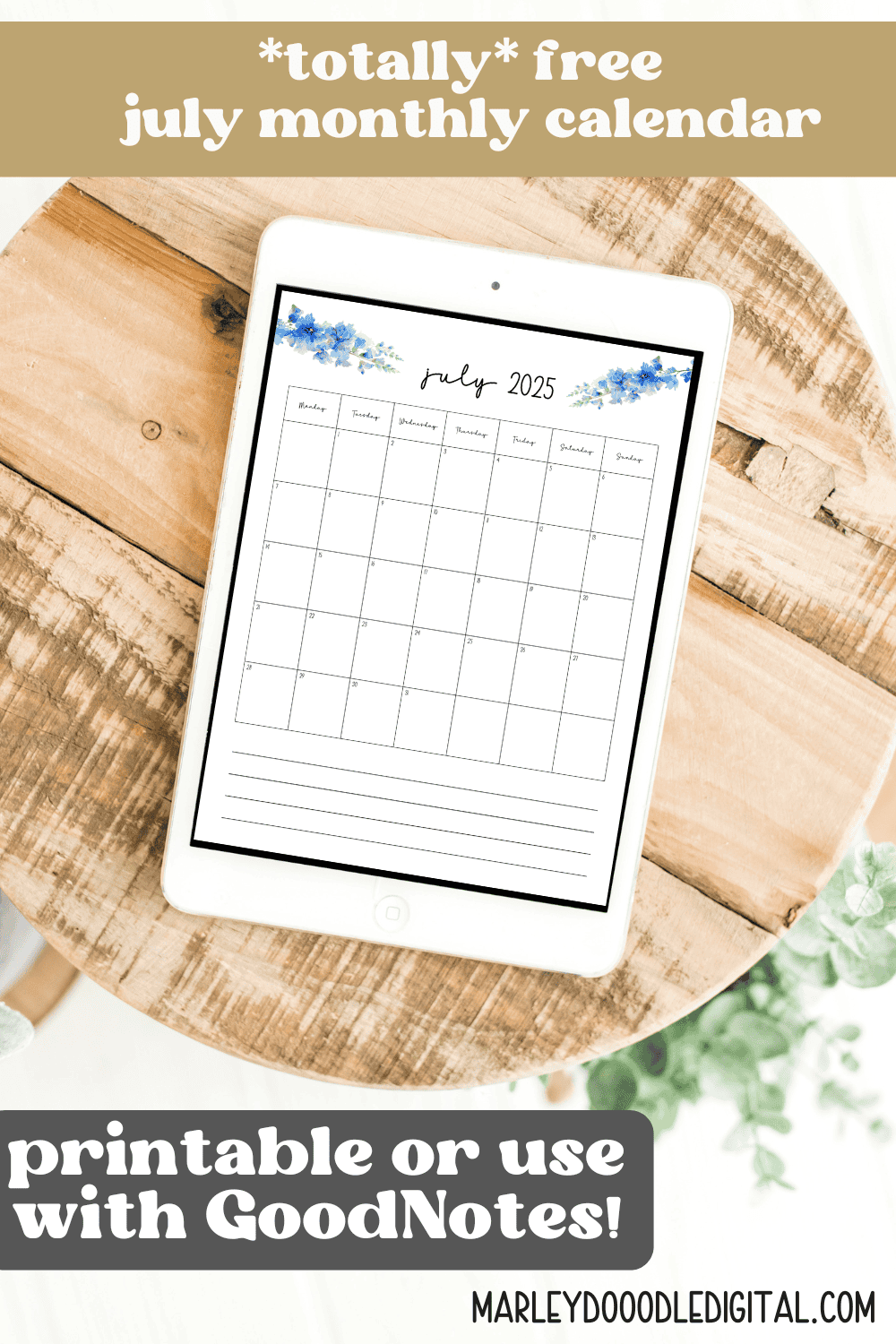 Digital tablet on wood table displaying a free printable July 2025 calendar with text overlay 'Totally free July monthly calendar – printable or use with GoodNotes.