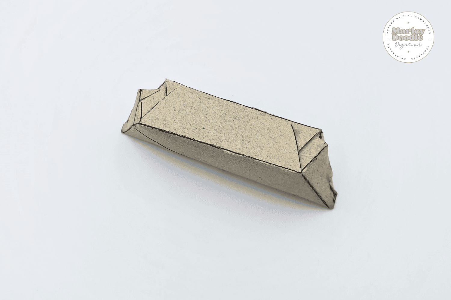 Completed folded base for toilet paper roll boat craft.