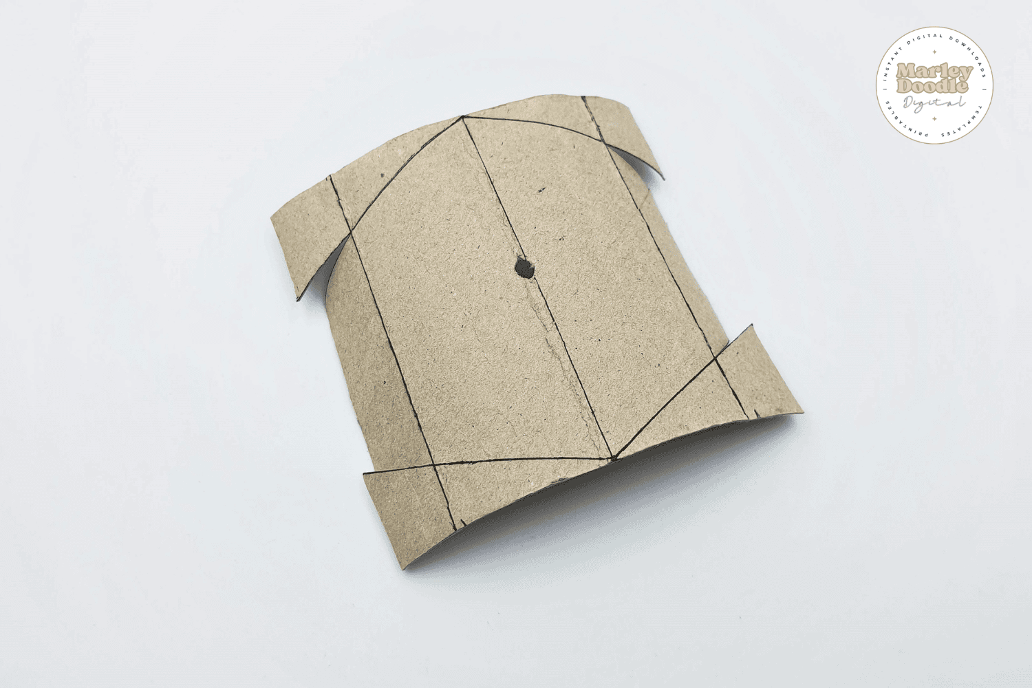 Toilet paper roll with center hole for DIY boat project.