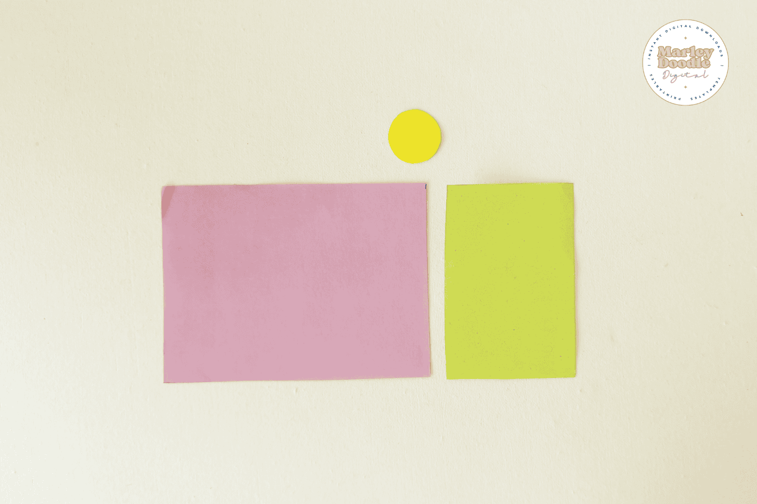 Colored paper pieces for paper flower wreath craft.