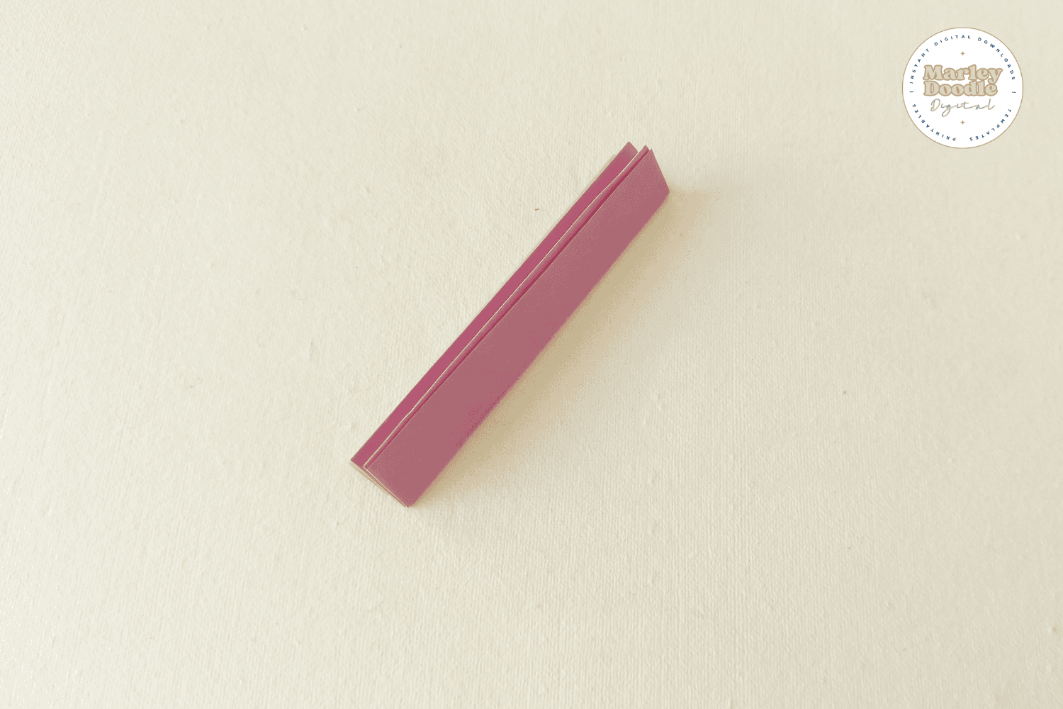 Accordion fold pink paper for DIY flower petal.