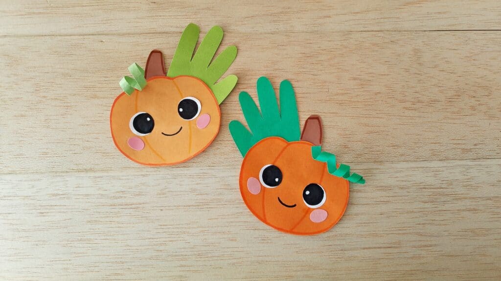 Handprint Pumpkin Craft by The Mindful Toddler